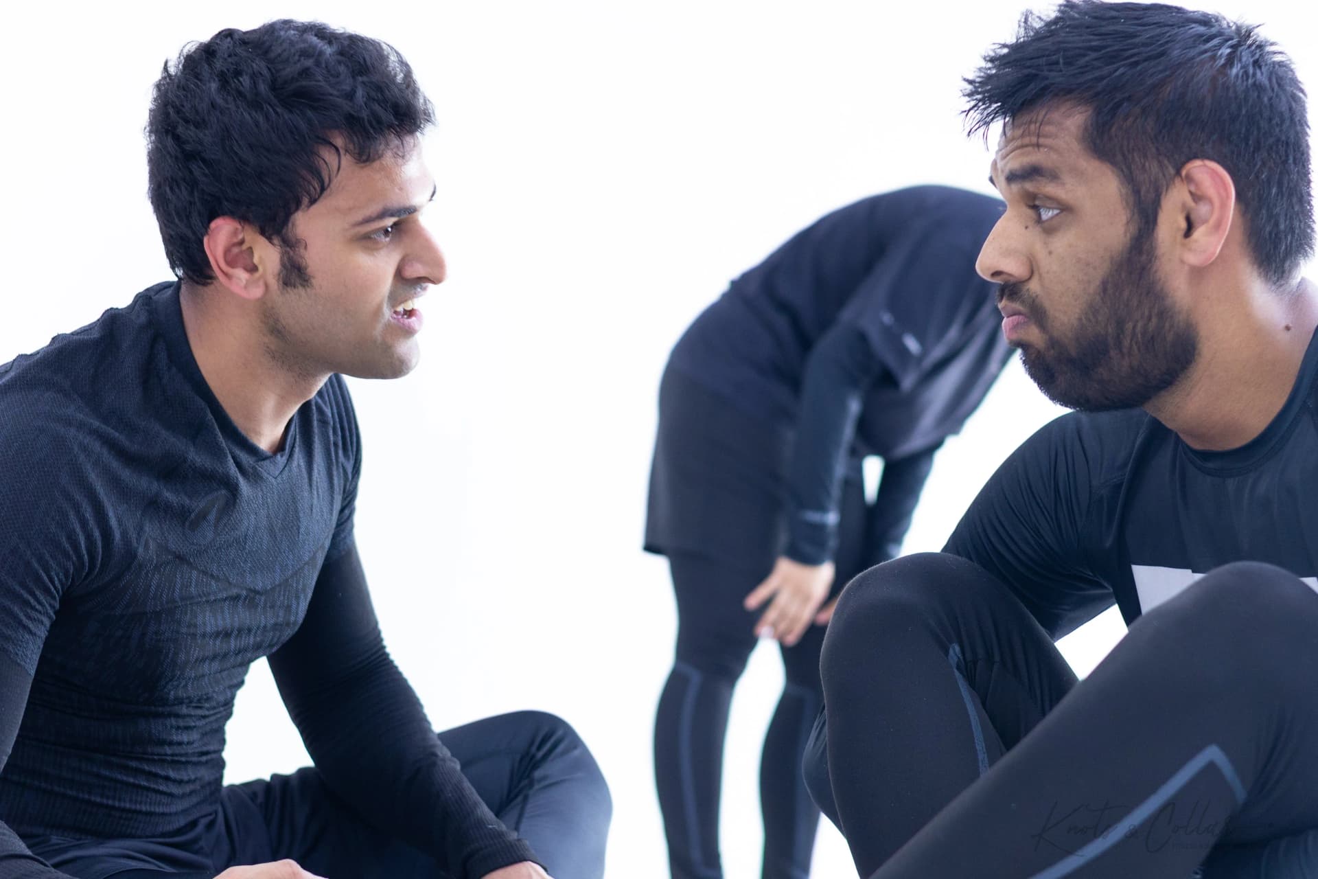 BJJ practitioners in focused conversation at Knots and Collar Defence Colony New Delhi