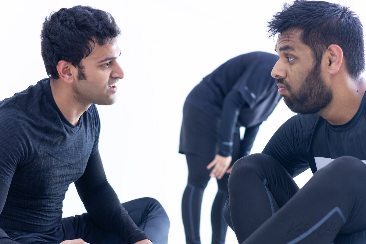 BJJ practitioners in focused conversation at Knots and Collar Defence Colony New Delhi