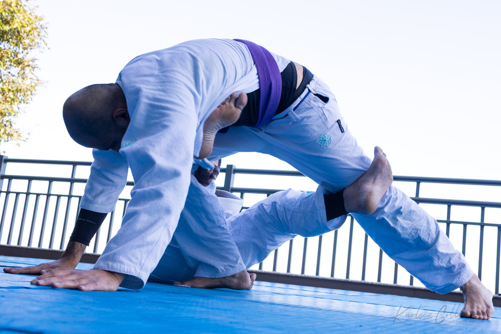 BJJ guard pass drill during outdoor training at KC Manthan retreat