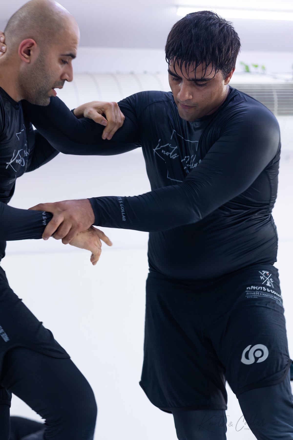 BJJ self-defence technique practised against a genuinely resisting training partner