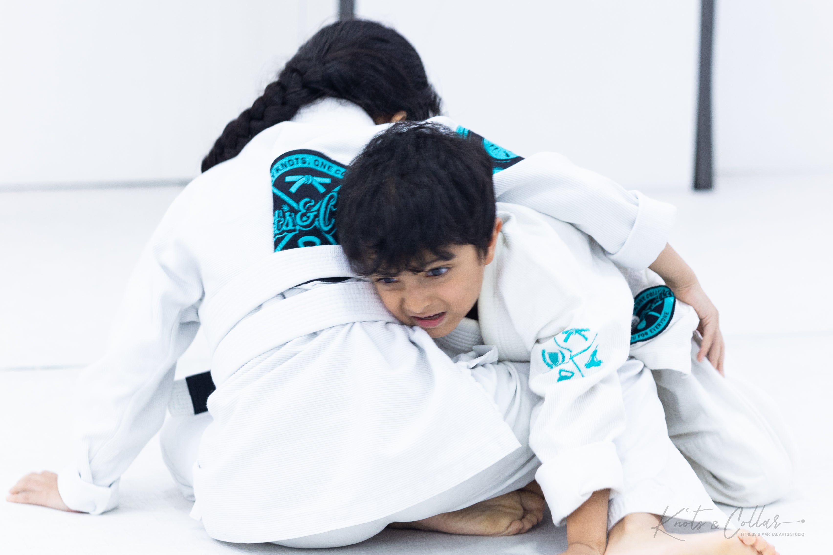 Young students in gi uniform at Knots and Collar kids class New Delhi