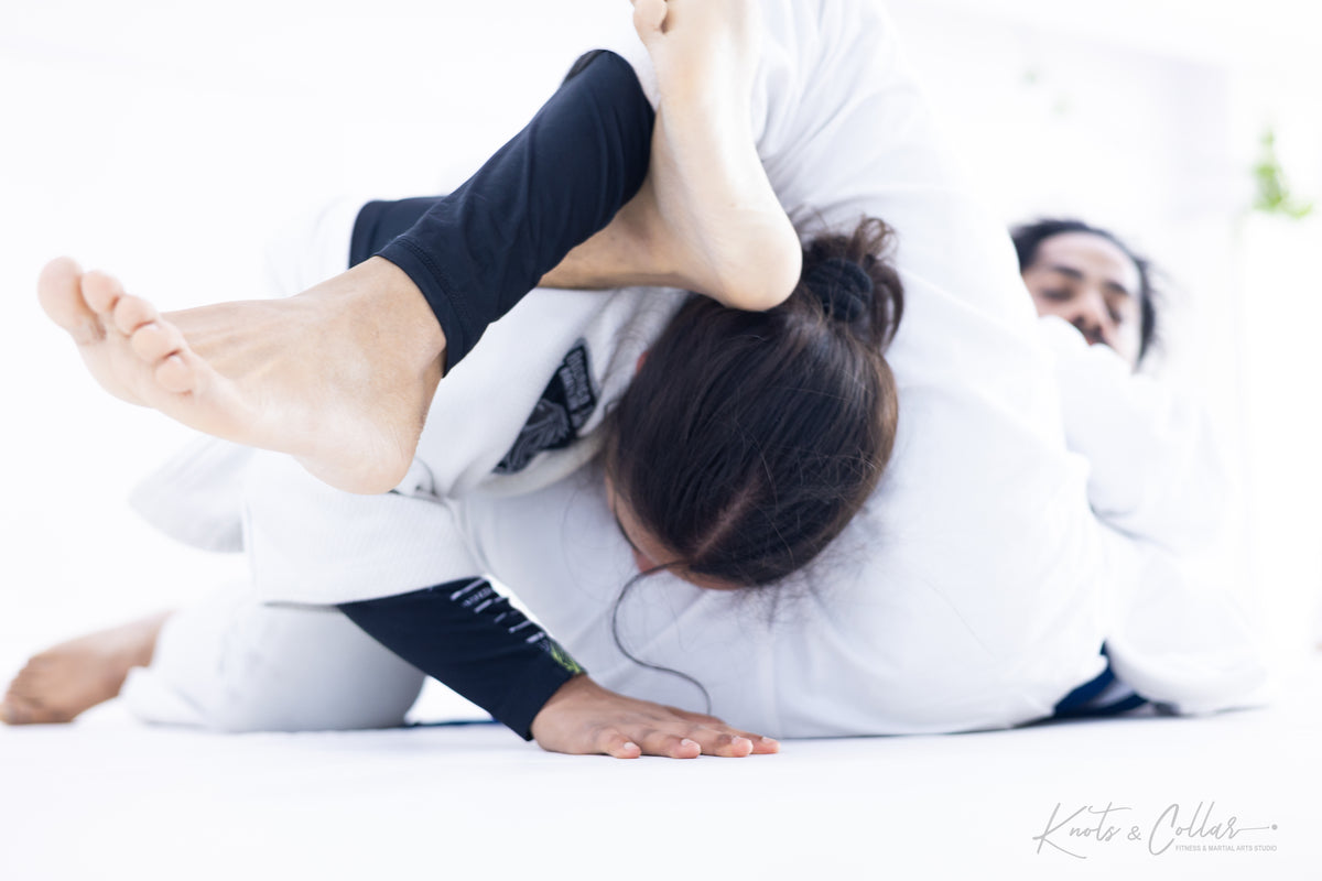 Gi BJJ ground control position at Knots and Collar Defence Colony Delhi