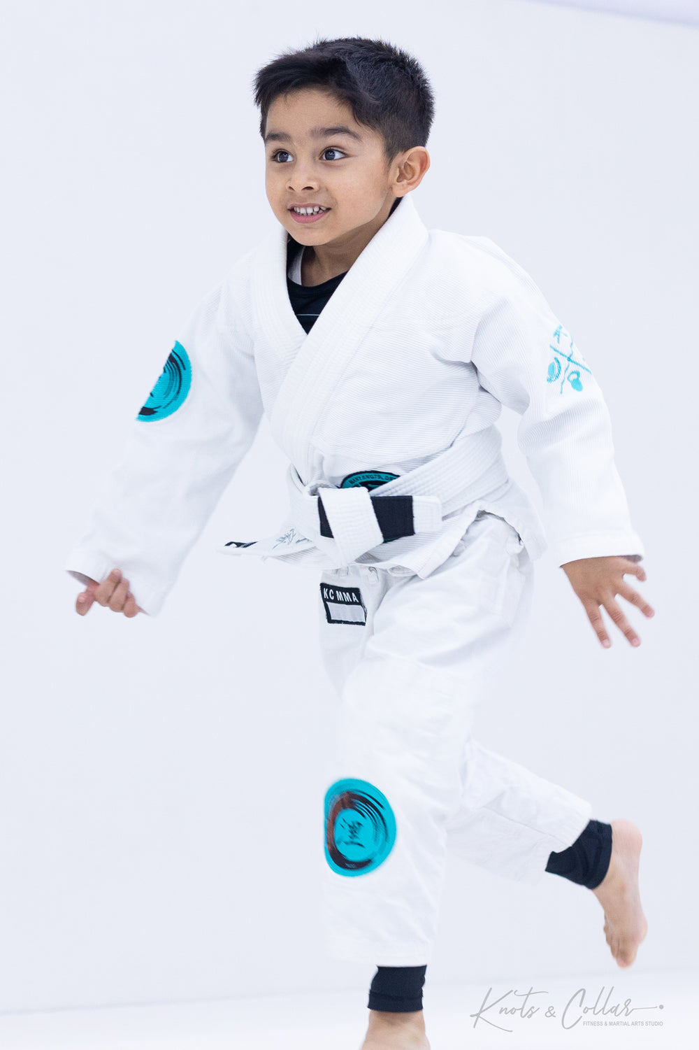 Young student in BJJ ready stance at Knots and Collar kids martial arts class Defence Colony Delhi