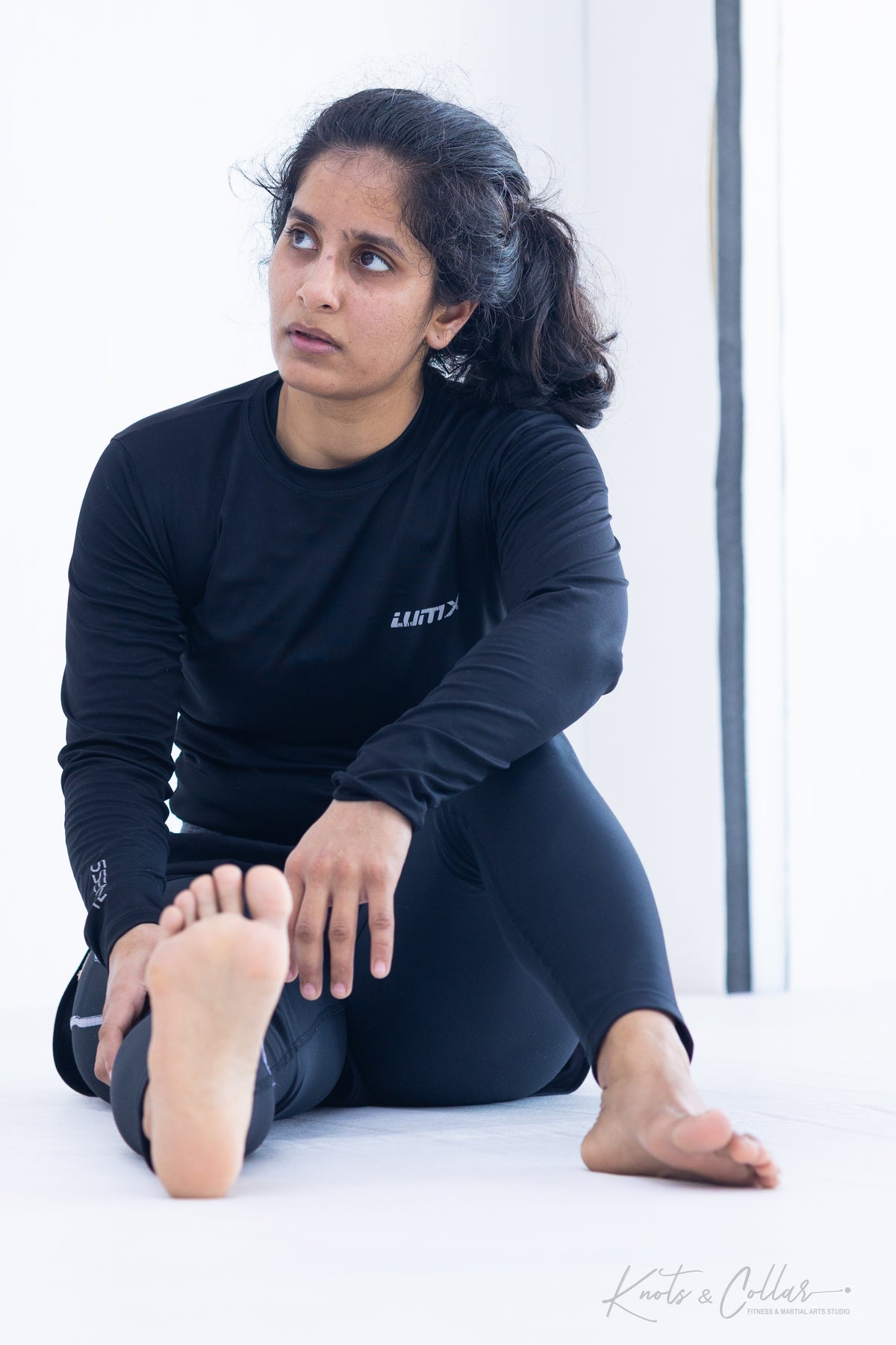 Woman training No-Gi BJJ at Knots and Collar Defence Colony New Delhi